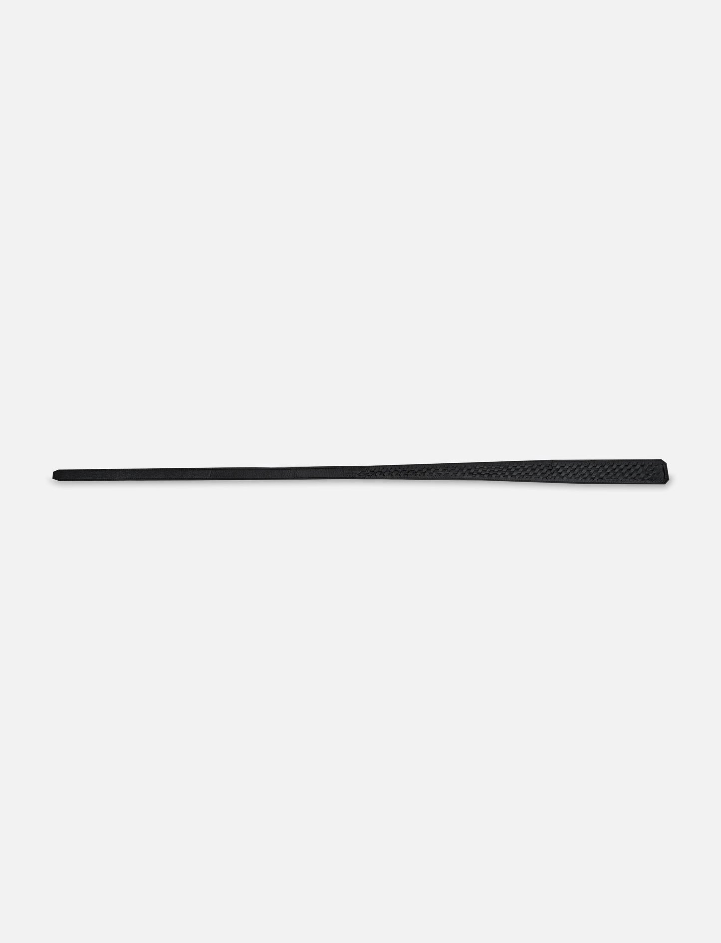 Long black textured leather belt with pointed tip on light gray background