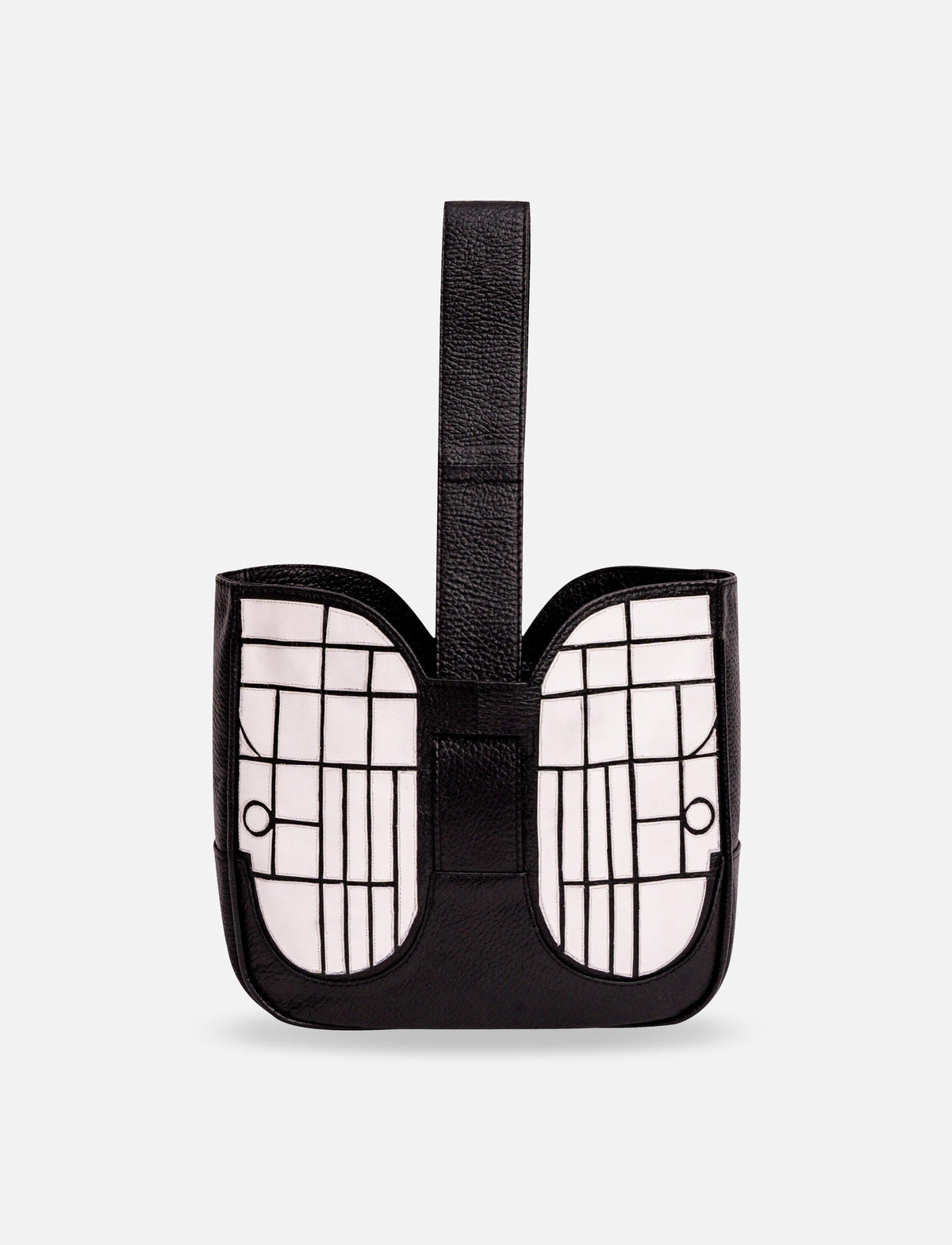 Black and white leather handbag with geometric grid pattern and top handle