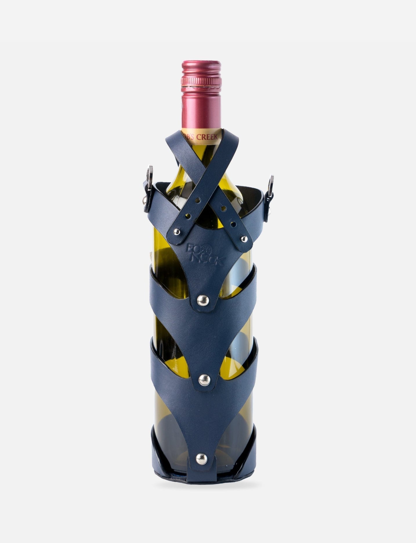 Wine bottle with metallic blue leather stitched case and silver rivets on white background