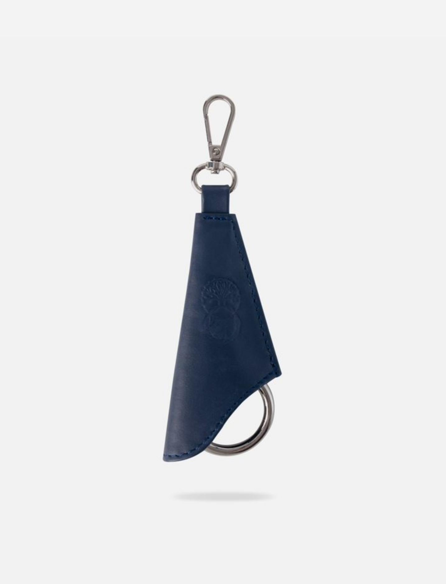 Timeless metallic blue leather keychain with silver clip and key ring, handcrafted in India