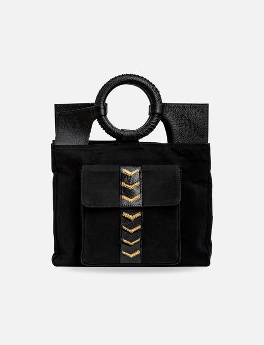 Black canvas tote bag with round leather handles and front pocket with gold chevron details