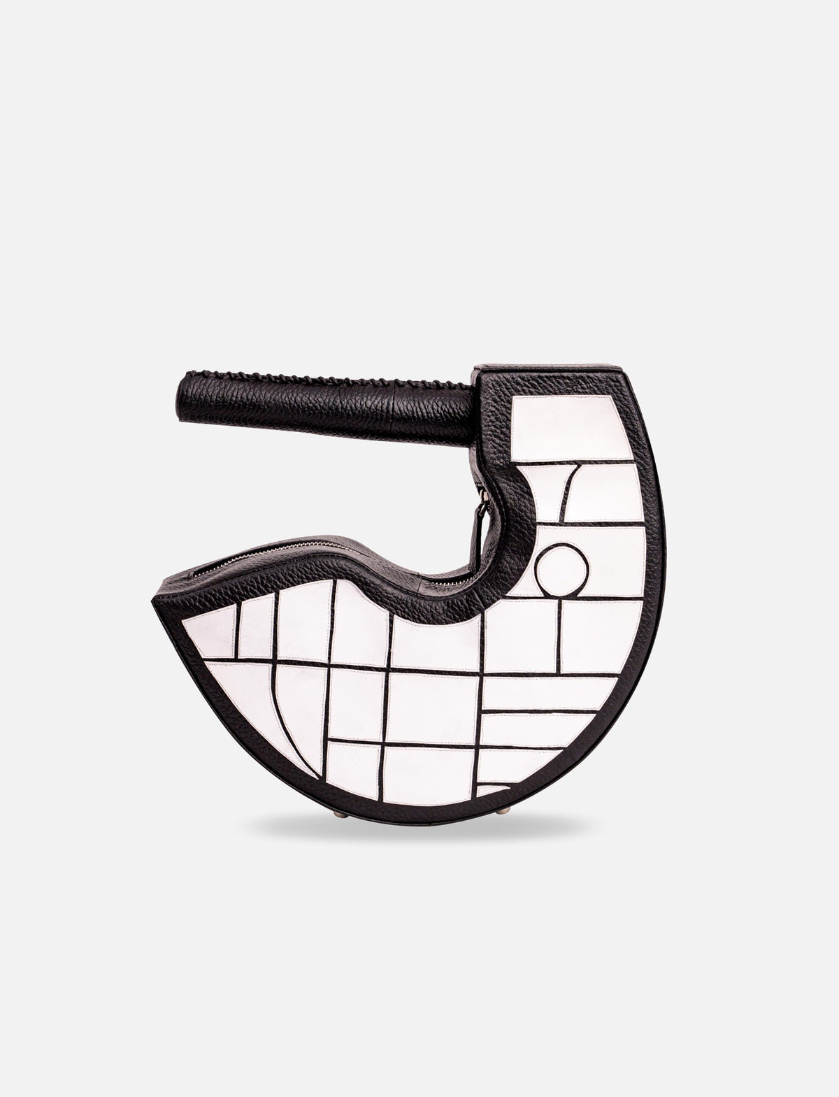 Black and white leather handbag with geometric patterns and a curved handle