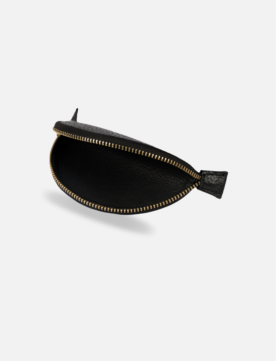 Timeless black upcycled leather pouch with gold zipper, handcrafted in India on white background