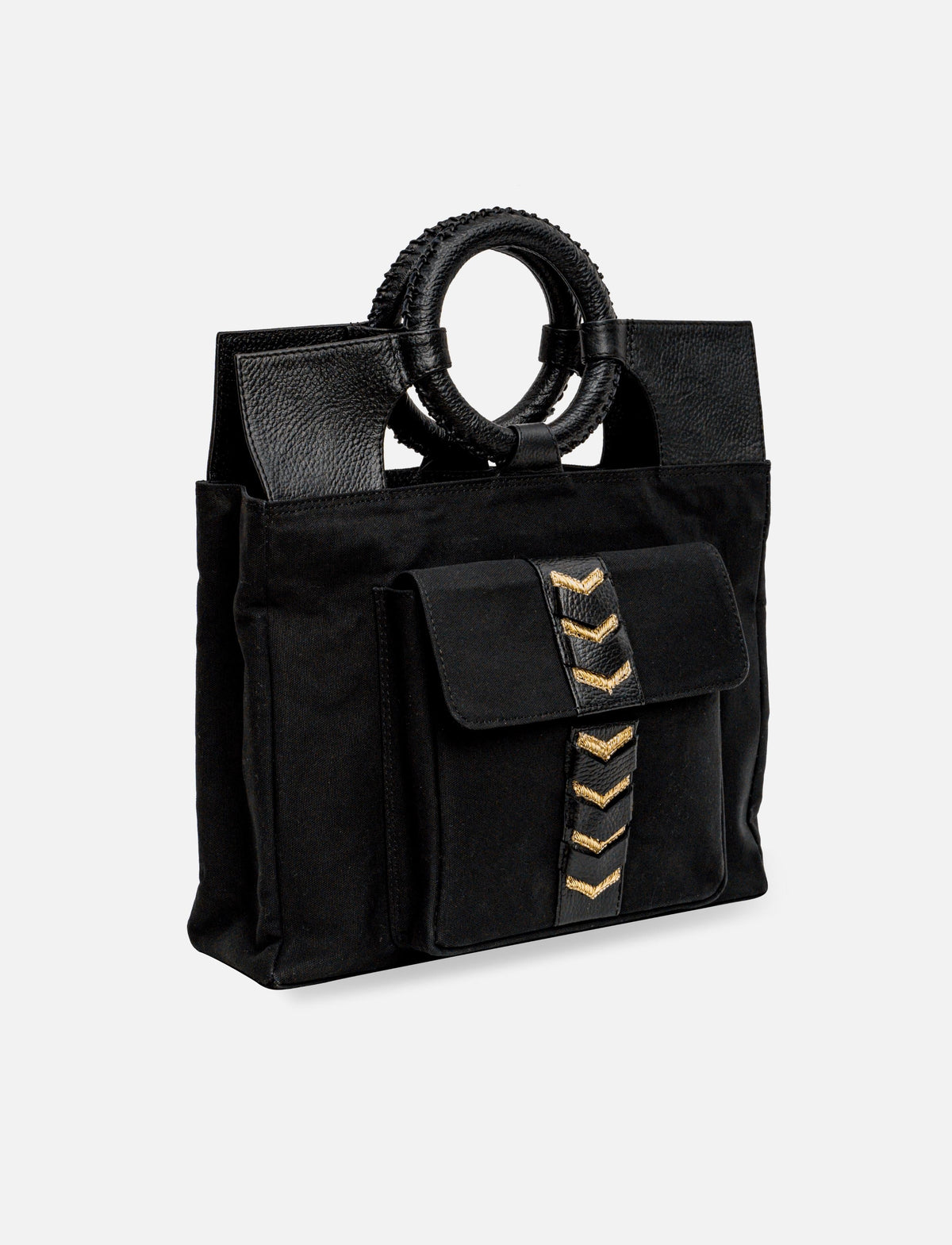Black tote bag with leather handles and front pocket featuring gold chevron embroidery