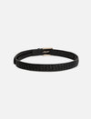Black leather belt with woven texture and silver buckle on white background
