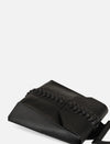 Black leather clutch bag with intricate braided detail on flap against white background
