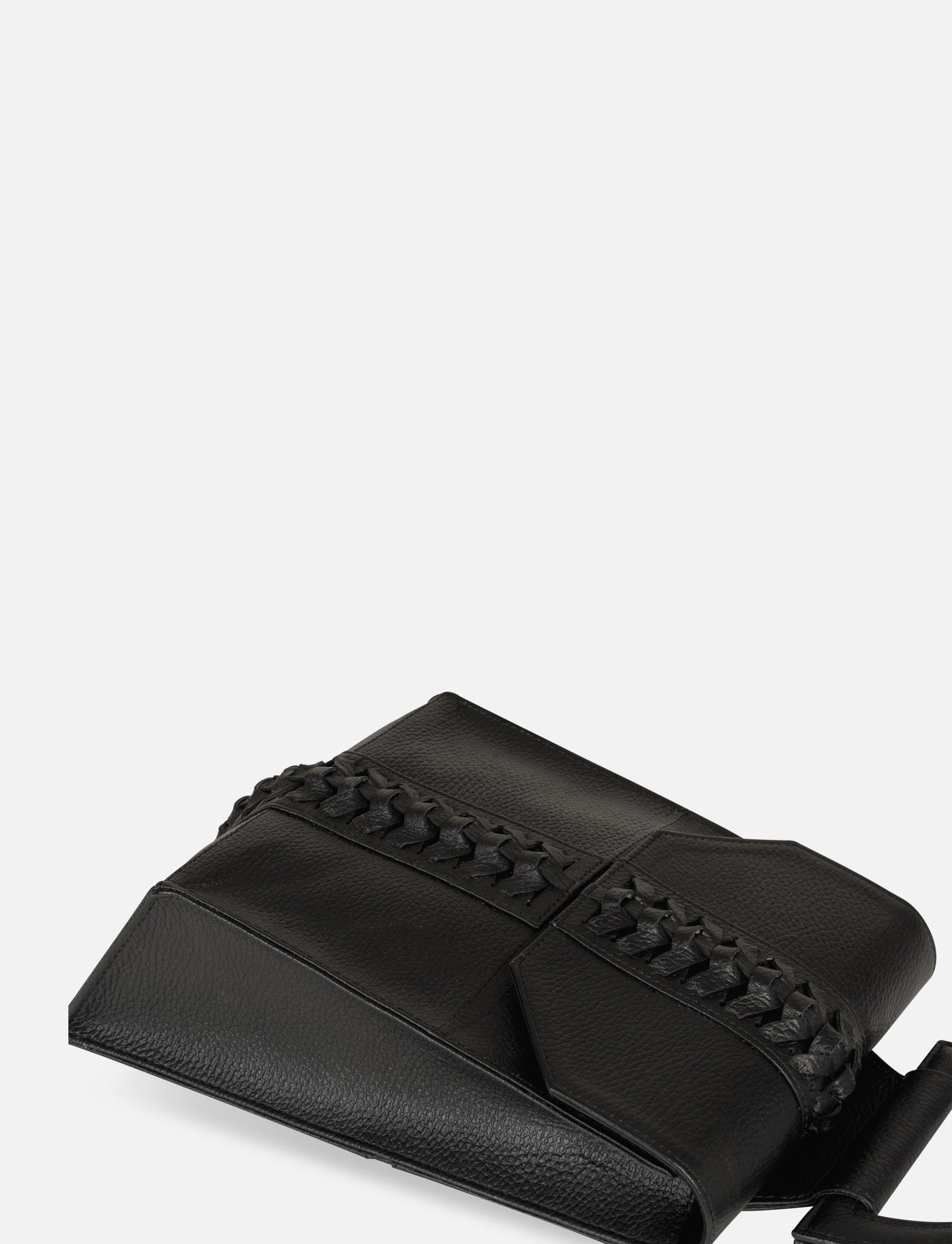 Black leather clutch bag with intricate braided detail on flap against white background