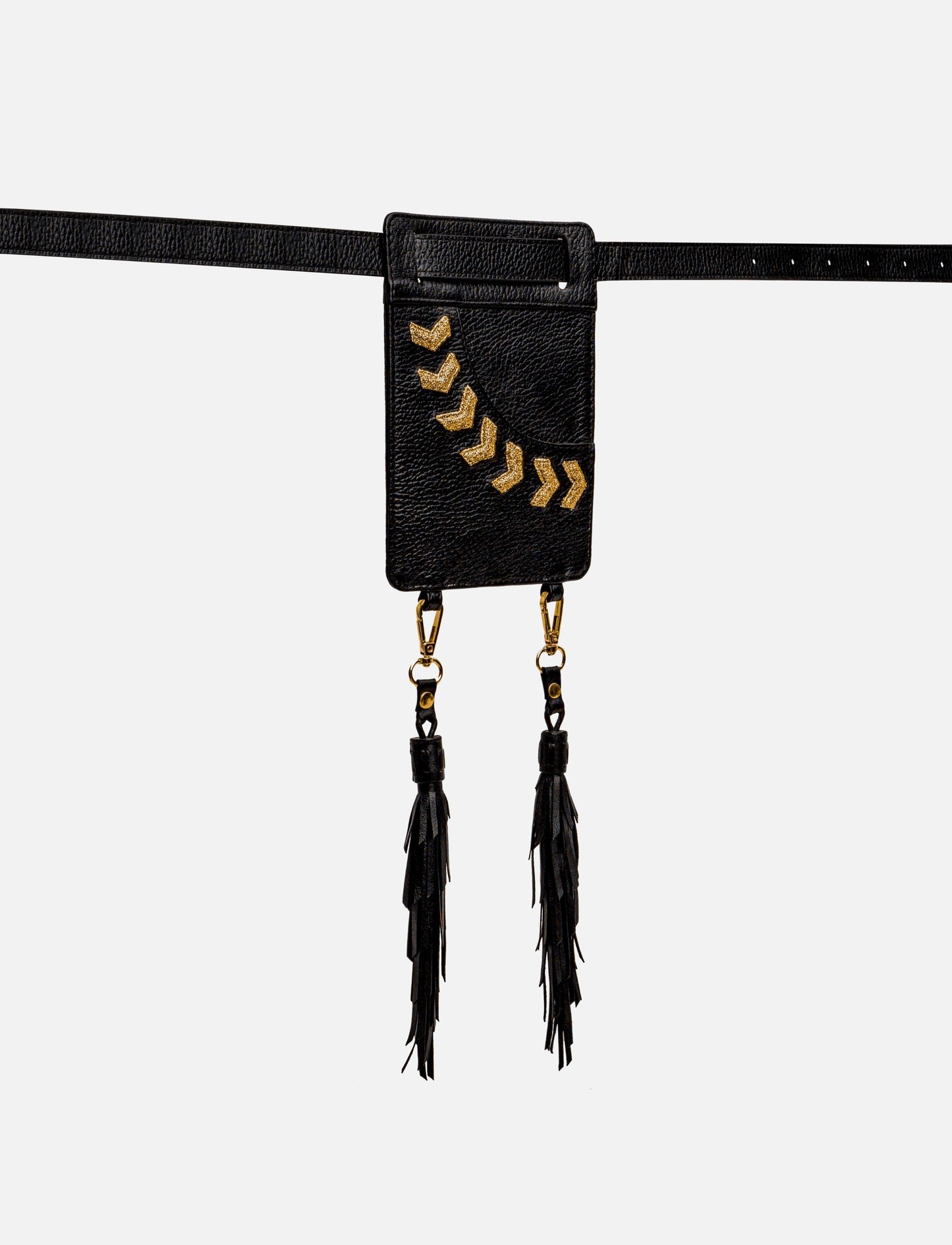 Black leather belt bag with gold chevron embroidery and dual black tassels on white background