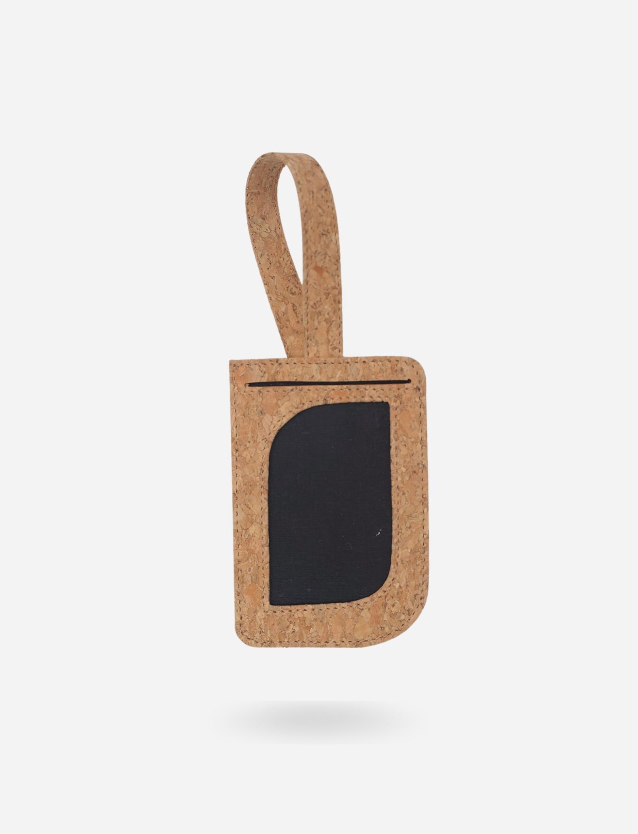 Timeless cork luggage tag with black ID window and loop handle on white background