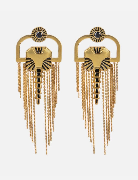 Pair of gold metal earrings with black enamel accents and multiple hanging chain tassels on white background