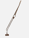 Timeless tan braided leather phone sling with metal clasp and Eco Rock tag