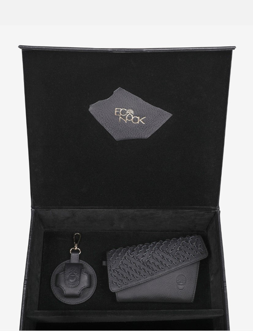Black upcycled leather gift box with woven design wallet and round keychain by Econock