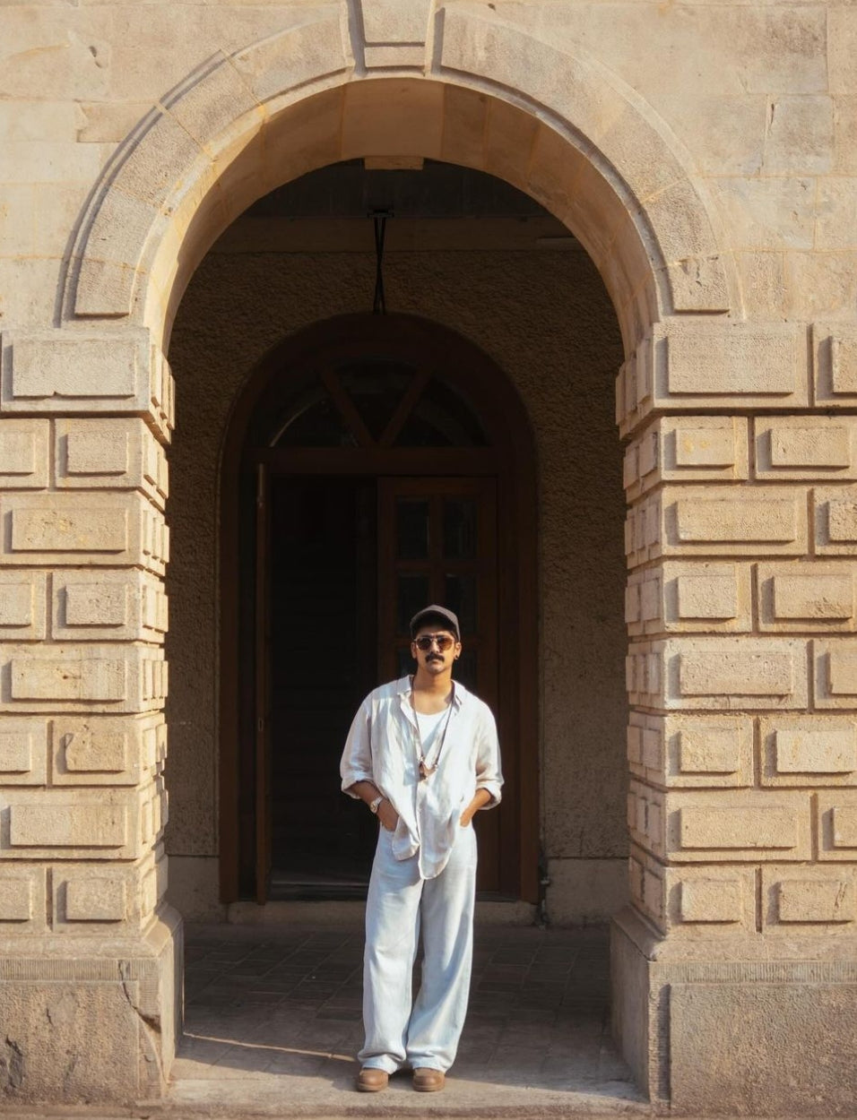 Designer Eyewear accessory Sunglass case holder white with lanyard worn on day event vacation