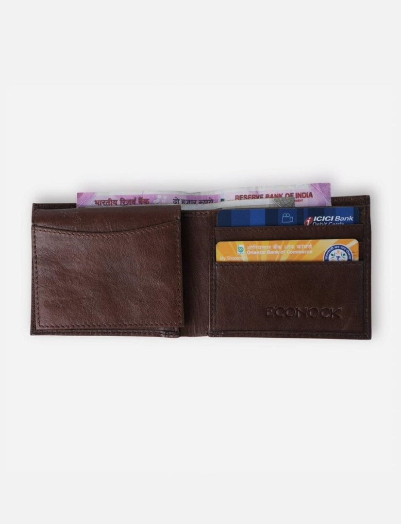 Open brown leather men's wallet with Indian currency and bank cards ICICI and Oriental Bank of Commerce