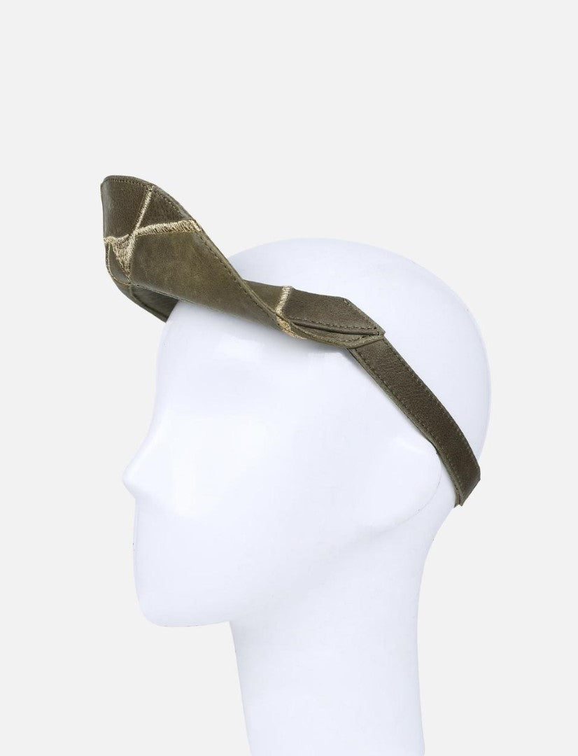 timeless olive leather visor hat with gold embroidery on mannequin head