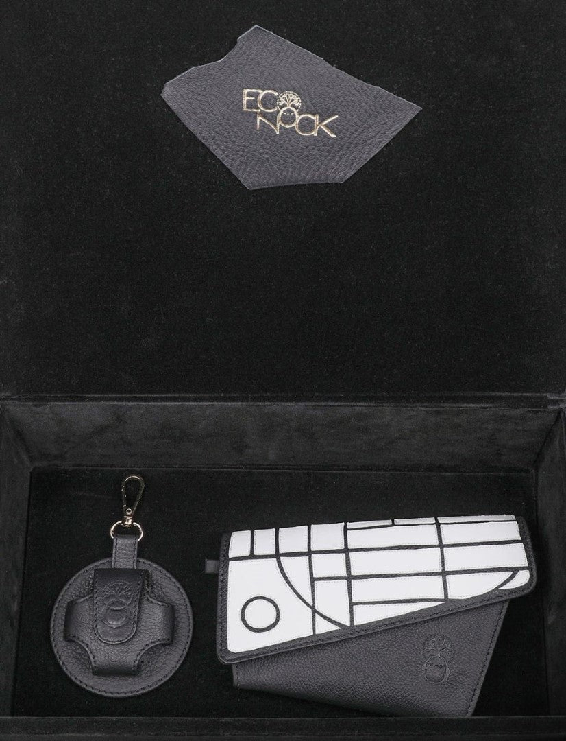 Eco-friendly black and white leather wallet and keychain in black gift box with EcoKnock logo