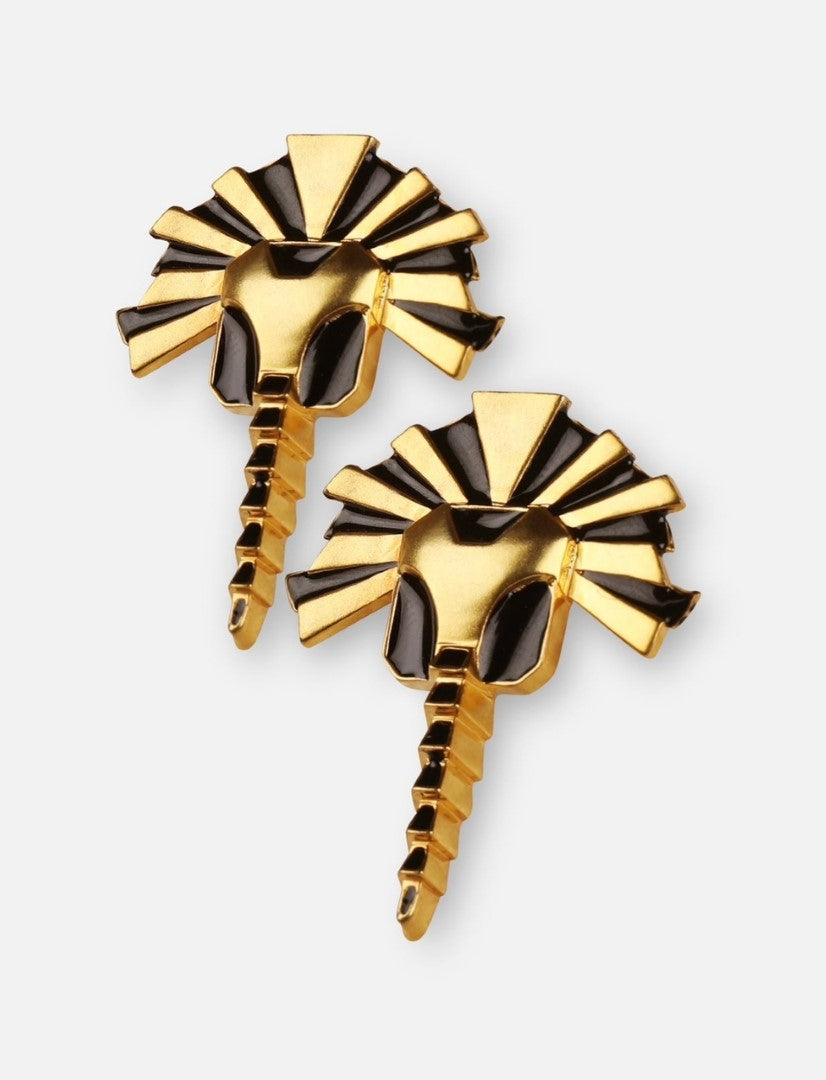 Gold and black enamel lion head earrings with detailed mane design on white background