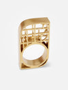Modern geometric gold ring with open lattice design on white background