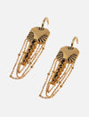 Gold elephant-shaped earrings with black enamel accents and dangling chain details on white background