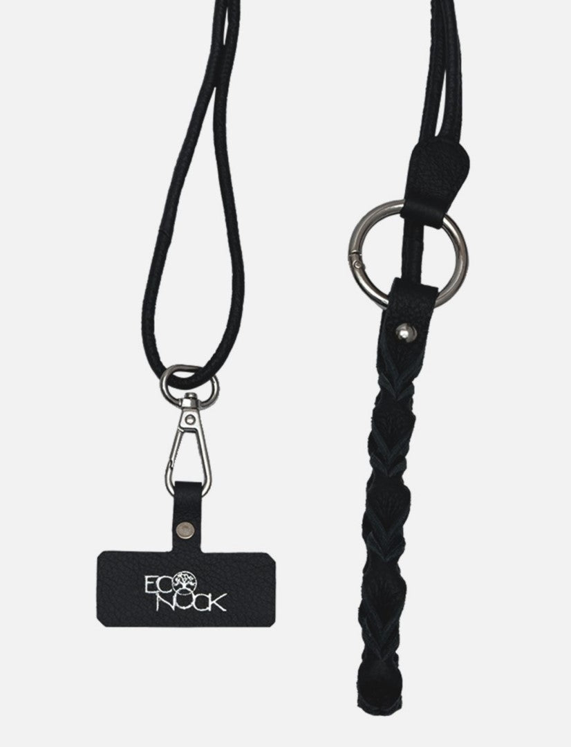 Black leather phone sling lanyard and braided keychain with metallic ring on white background
