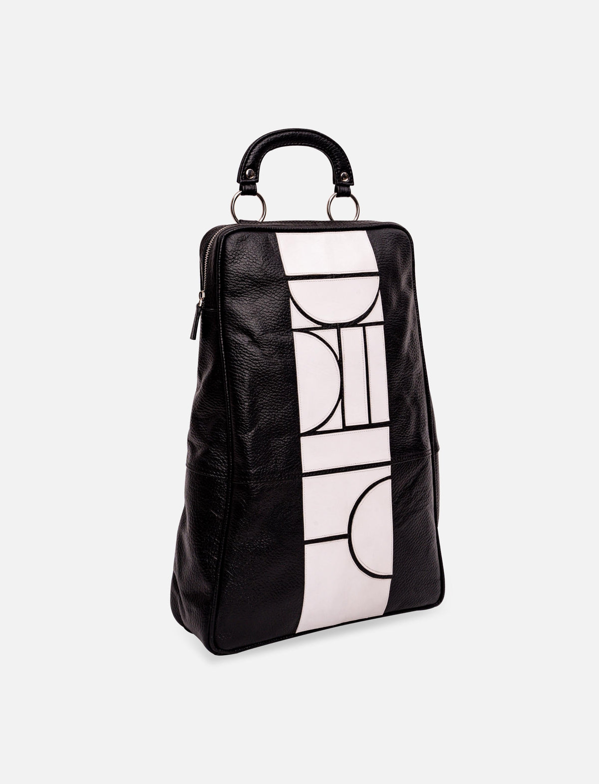Black leather handbag with white geometric pattern and top handle on white background