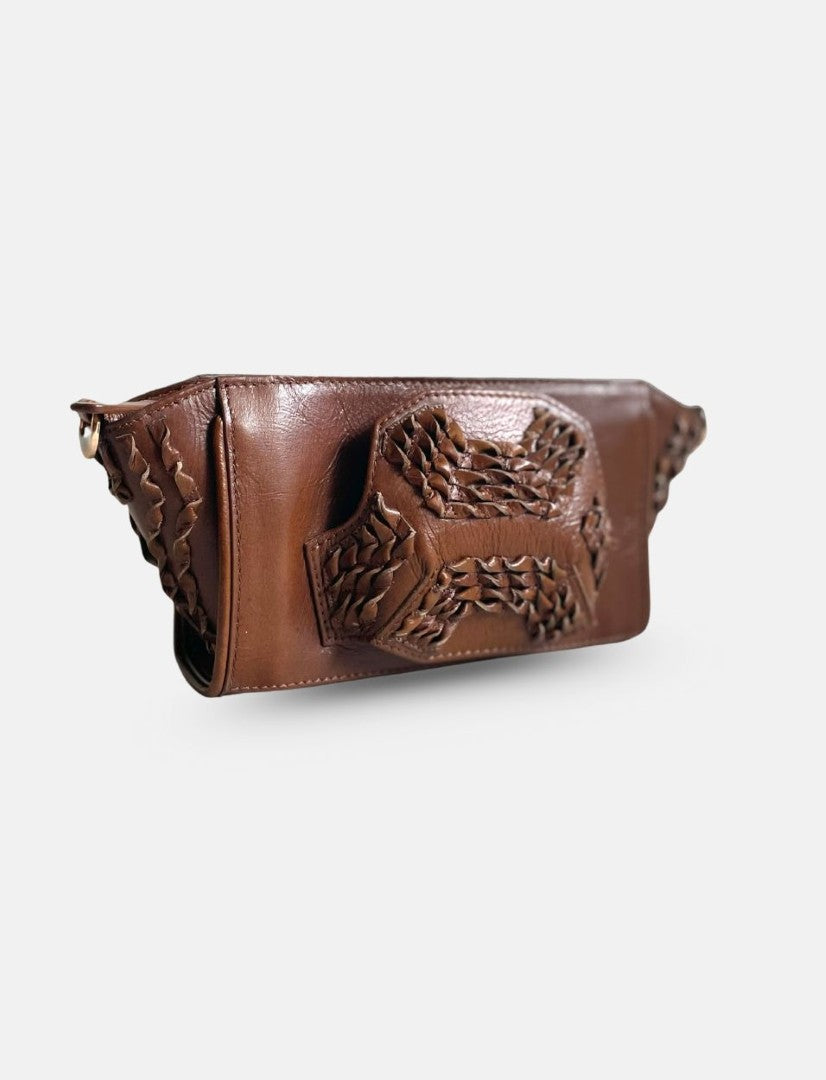 Timeless tan leather wristlet bag with handwoven woven accents, handcrafted in India