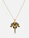 Gold and black enamel pendant necklace with a stylized lion head design on a gold chain