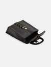 Black leather handbag with gold button closure and decorative gold chevron accents