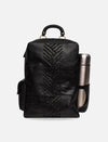 Black leather backpack with braided center design and metal water bottle in side pocket