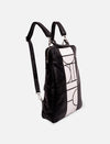 Black leather backpack with white geometric pattern and adjustable shoulder straps