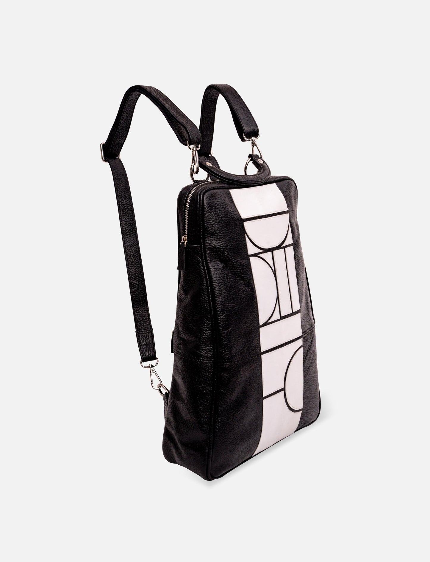 Black leather backpack with white geometric pattern and adjustable shoulder straps