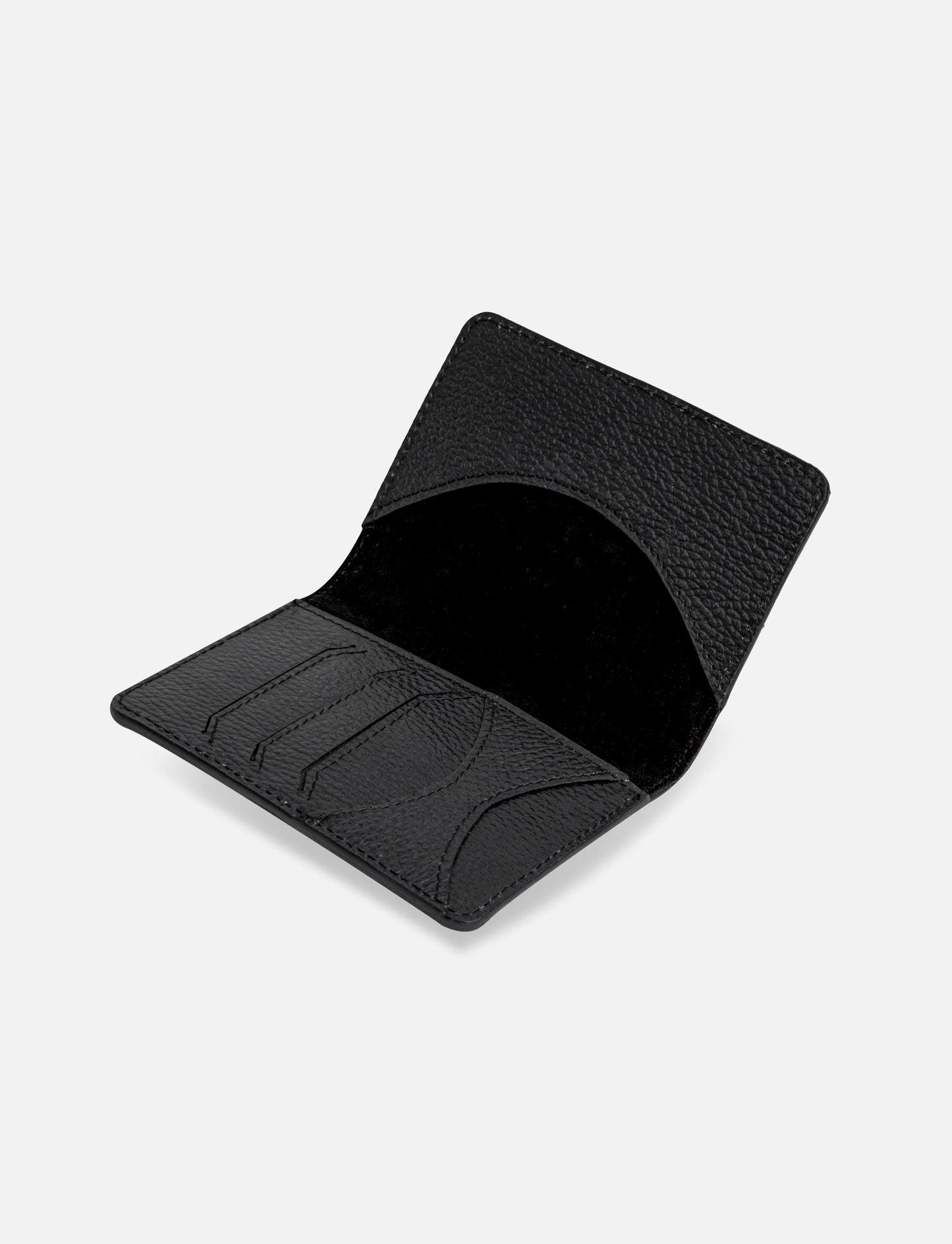 Open black textured leather card holder wallet with three card slots and curved inner pocket