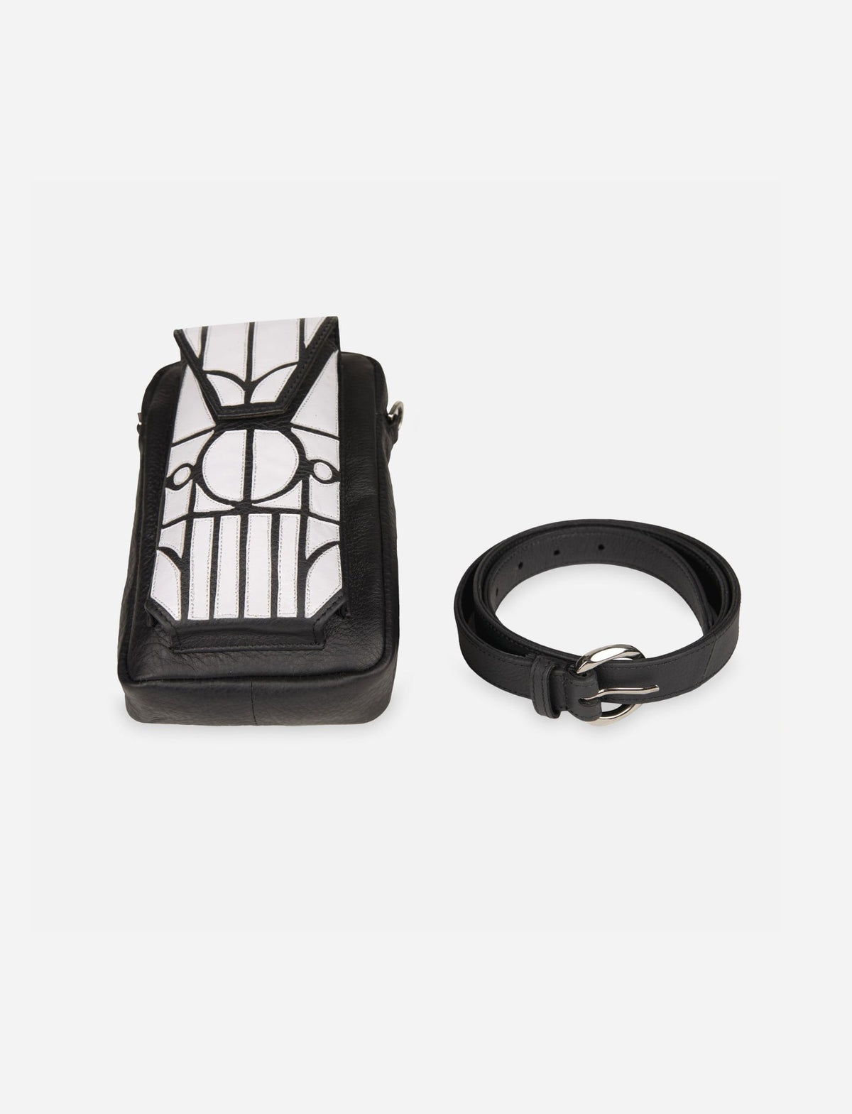 Black leather thigh bag with white applique design and matching black leather belt on white background