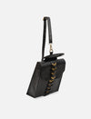 Black leather crossbody bag with gold chevron detailing and adjustable strap on white background