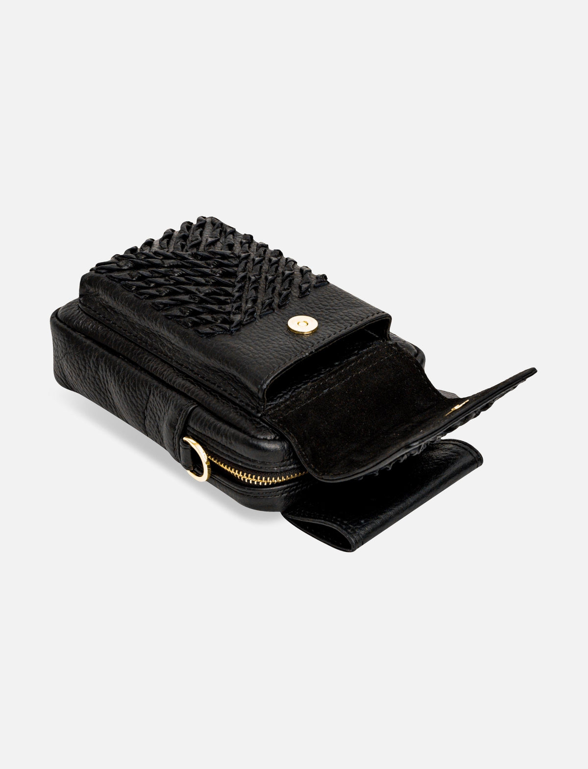 Black leather crossbody bag with woven flap, gold magnetic snap, and zipper pocket