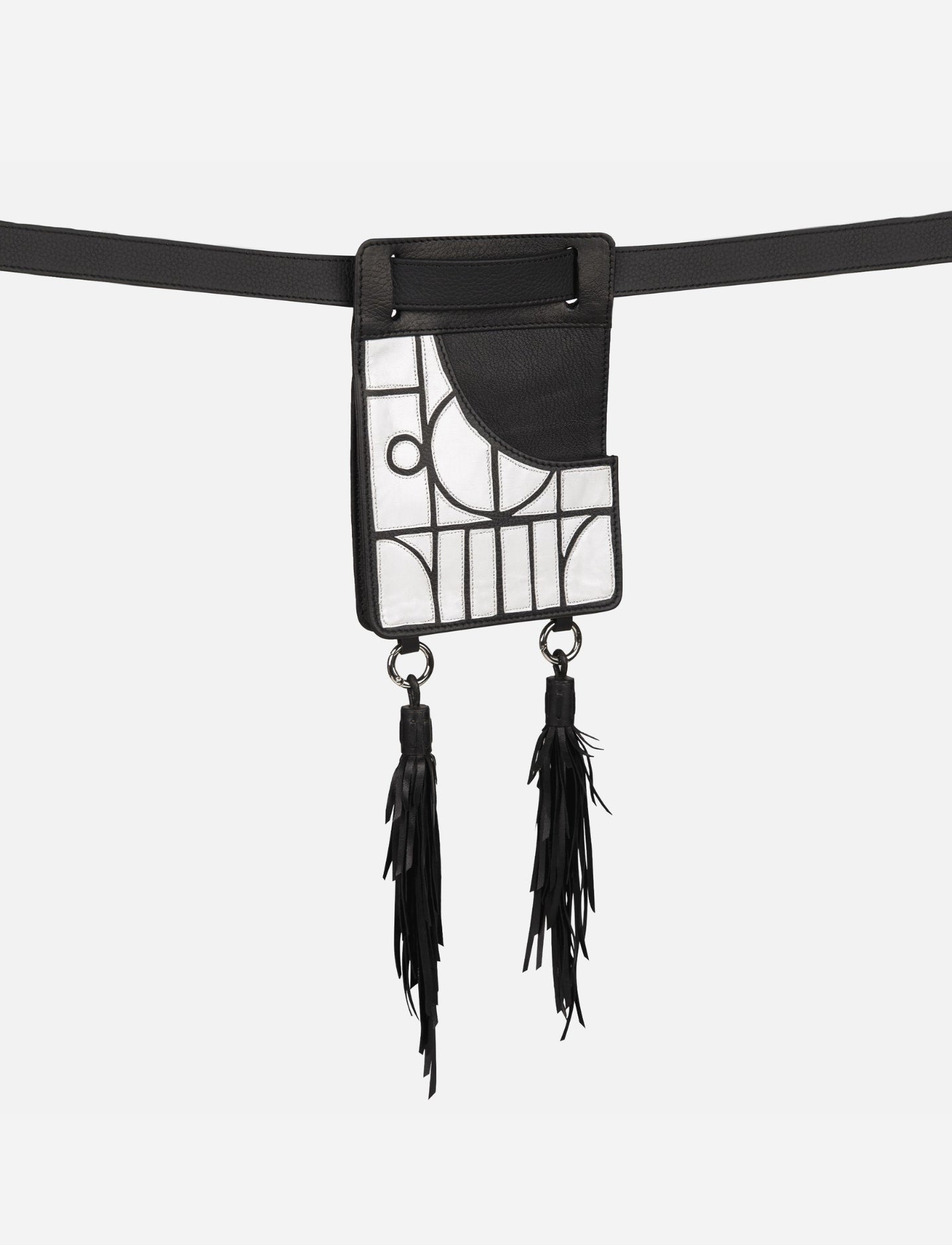 Black leather thigh bag with geometric white applique and two long black fringe tassels