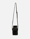 Black textured leather crossbody bag with adjustable strap and gold hardware on white background